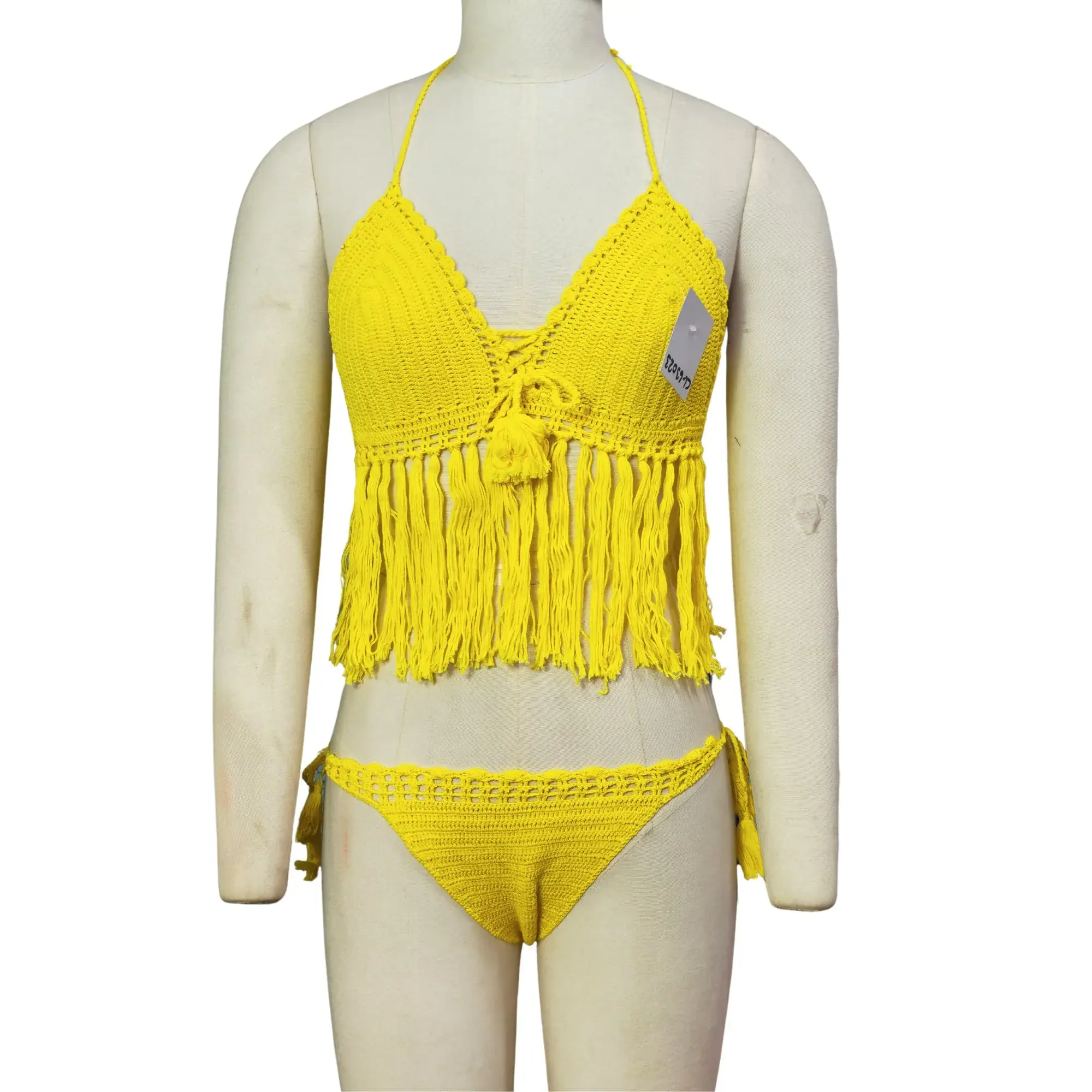 Yellow crochet bikini lingerie set with fringed top and mid-waist bikini bottom for swim and beach occasions.